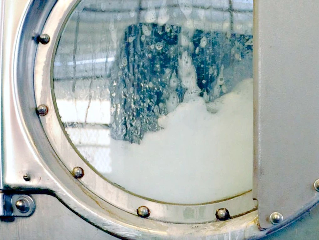 Oregon Linen & Uniform Industrial Washing Machine Using Eco-Friendly Soaps