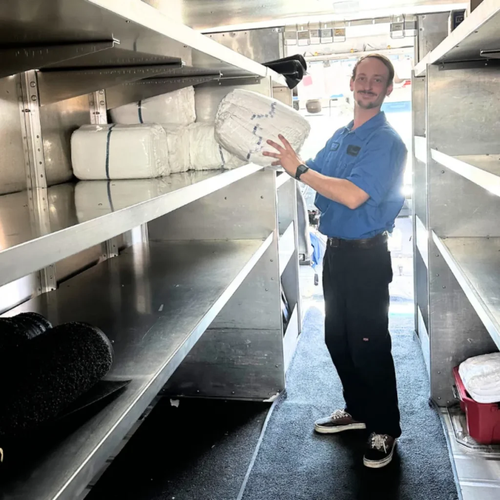 Worker loading a delivery truck